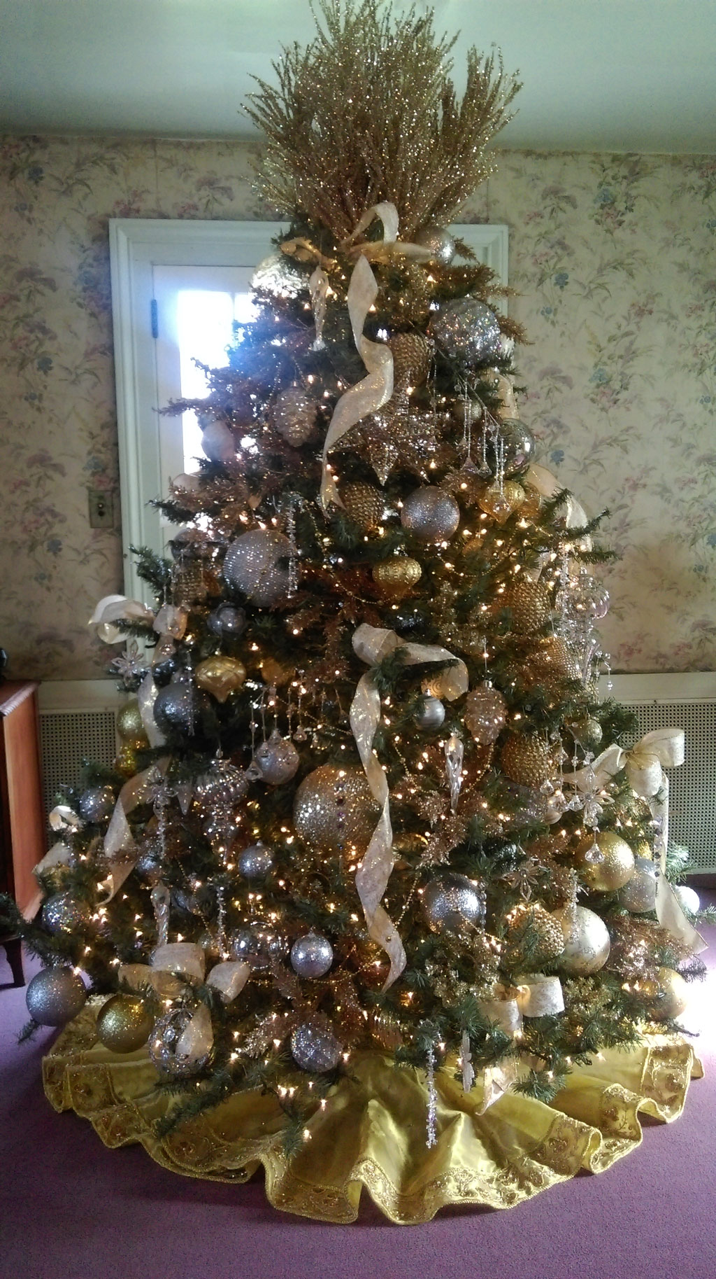 Pine Tree with decorations inside room
